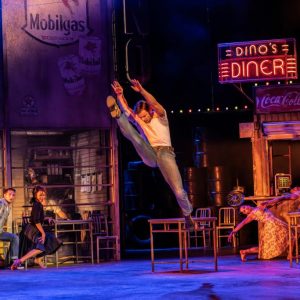 Matthew Bourne's THE CAR MAN. Harrison Dowzell (Luca) and Company. Photo by Johan Persson